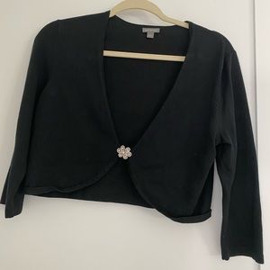 Ann Taylor black shrug w/rhinestone clasp.